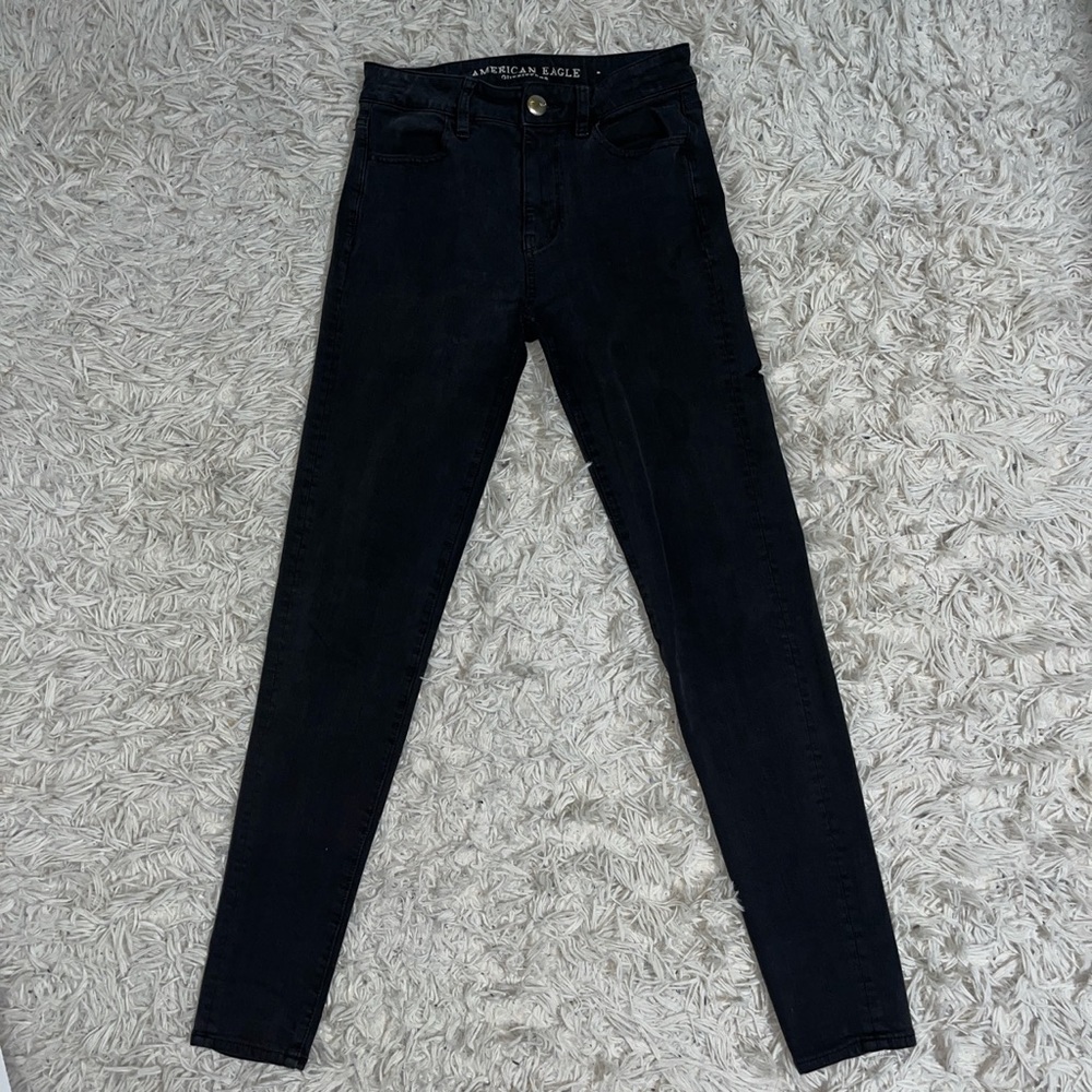 Stretchy black jeggings size 0 from American Eagle.
